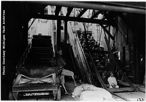 Soldiers and mine workers go underground in C&H's #5 shaft, during August of 1913. (Photo courtesy of Michigan Tech Archives, Keweenaw Digital Archive)