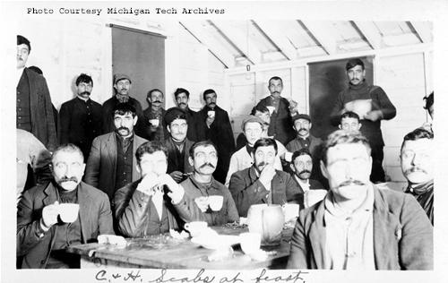 C & H replacement workers eating and enjoying their coffee. Imported men brought in to work during a strike were often referred to as scabs. (Photo courtesy of the Michigan Tech Archives, Keweenaw Digital Archives)